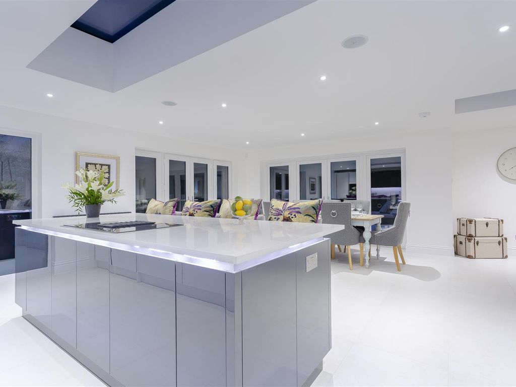 Grey and white kitchen/dining room